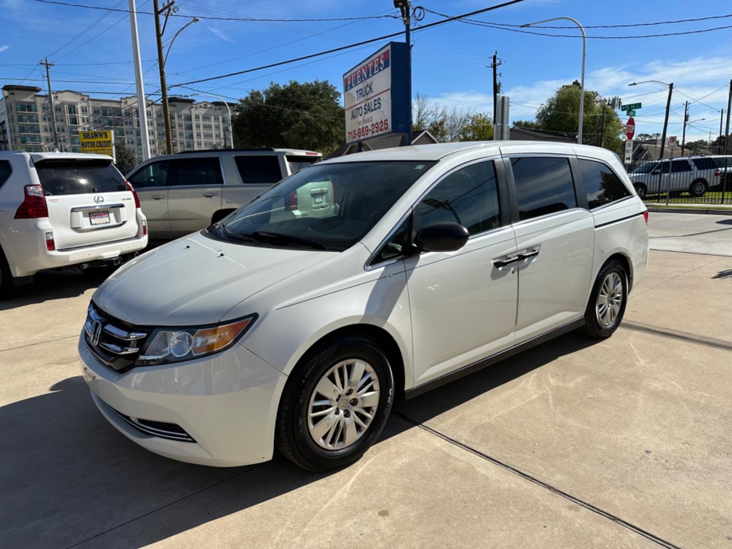 2014 White /Beige Honda Odyssey LX (5FNRL5H29EB) with an 3.5L V6 SOHC 24V engine, 6-Speed Automatic transmission, located at 1501 West 15th St., Houston, 77008, (713) 869-2925, 29.797941, -95.411789 - Photo#0